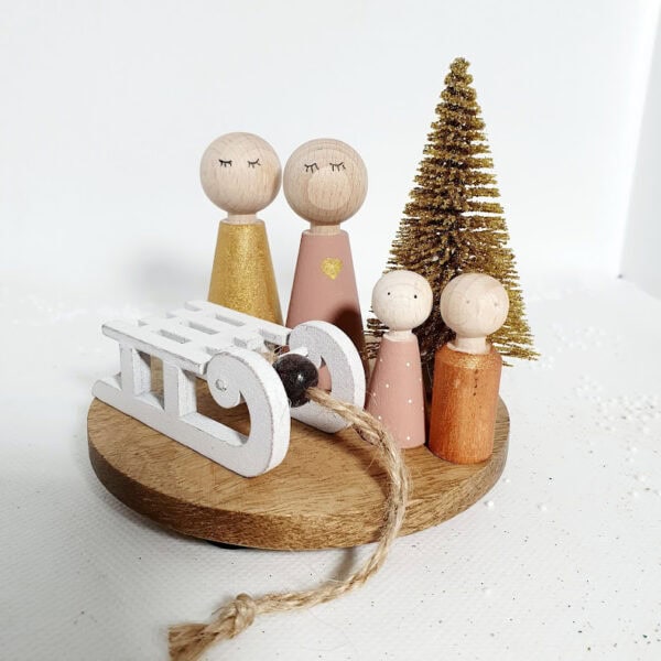 Ronde houten plateau (10 cm dia) - quote ster - kleine gouden kerstboom en slee